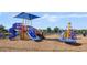 Community playground with multiple slides and structures to encourage active play and fun for families and children at 4623 Wandsworth Way, Davenport, FL 33837