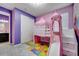 Bright and colorful bedroom featuring a play tent over a bunk at 4717 Weatherbell Rd, Winter Garden, FL 34787