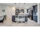 Modern kitchen with granite countertops, stainless steel appliances, and barstool seating at 4717 Weatherbell Rd, Winter Garden, FL 34787