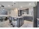 Well-equipped kitchen with a central island and bar stool seating at 4717 Weatherbell Rd, Winter Garden, FL 34787