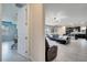 Open-concept living space with seamless flow, connecting living, dining, and kitchen areas at 4717 Weatherbell Rd, Winter Garden, FL 34787