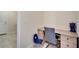 Cozy room with a small desk and a storage cabinet, perfect for a home office at 4717 Weatherbell Rd, Winter Garden, FL 34787