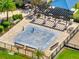 Aerial view of the splash pad featuring a pergola and seating area for community gatherings at 4717 Weatherbell Rd, Winter Garden, FL 34787