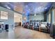 Home theater features luxury seating, starry ceiling, projector, and large screen for entertainment at 4717 Weatherbell Rd, Winter Garden, FL 34787