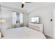 Bright bedroom with a plush bed, ample natural light, and modern furnishings at 4721 Clock Tower Dr # 106, Kissimmee, FL 34746