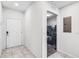 Bright entryway with tile flooring and a view into a bedroom with bunk beds at 4721 Clock Tower Dr # 106, Kissimmee, FL 34746