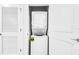 Convenient in-unit laundry closet with stacked washer and dryer at 4721 Clock Tower Dr # 106, Kissimmee, FL 34746