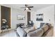Comfortable living area with stylish decor, modern accents, and a sleek wall-mounted TV at 4721 Clock Tower Dr # 106, Kissimmee, FL 34746
