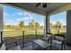 Relax on the back patio with a beautiful view of the community pond and greenspace at 4721 Clock Tower Dr # 106, Kissimmee, FL 34746