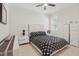 Beautiful bedroom featuring a modern design and black and white patterned bedspread at 4873 Old Oak Trl, St Cloud, FL 34771