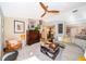 Comfortable living room with ceiling fan, stylish furniture, and plenty of natural light at 6051 Twin Lakes Dr, Oviedo, FL 32765