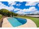 Beautiful backyard with a private pool overlooking a serene lake at 6051 Twin Lakes Dr, Oviedo, FL 32765