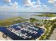 Aerial view of marina, docks, and waterfront restaurant providing beautiful scenery at 612 California Ave, St Cloud, FL 34769