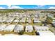 Wide aerial shot showcases a community with a mix of home styles, close to the water at 6462 Hollyberry Ne Ln, Winter Haven, FL 33881