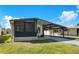 Charming single-story home with a covered carport and screened-in porch at 6462 Hollyberry Ne Ln, Winter Haven, FL 33881