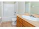 Bathroom with tub, shower, tile floor, and vanity at 6495 Fall St, St Cloud, FL 34771