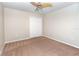 Cozy bedroom features neutral carpet and a large closet at 6495 Fall St, St Cloud, FL 34771