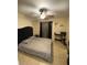 Comfortable bedroom featuring a ceiling fan, neutral colors, and a plush bed at 723 Michigan Ct # 3, St Cloud, FL 34769
