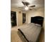 Cozy bedroom with a view of the closet and a comfortable bed at 723 Michigan Ct # 3, St Cloud, FL 34769