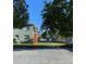 Two story home featuring large lawn in front at 723 Michigan Ct # 3, St Cloud, FL 34769