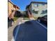 Apartment complex with parking, stairs, and landscaped grounds at 723 Michigan Ct # 3, St Cloud, FL 34769