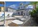 Inviting pool area features lounge chairs and lush greenery, perfect for relaxation and enjoyment at 7570 Excitement Dr, Reunion, FL 34747