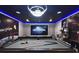 Themed basement offers a pool table, cinema, and gaming options for ultimate entertainment at 7570 Excitement Dr, Reunion, FL 34747