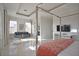 Bright and spacious main bedroom includes a sitting area and a TV at 7570 Excitement Dr, Reunion, FL 34747