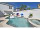 Relaxing outdoor living space featuring a private pool and lounge area for ultimate comfort at 7570 Excitement Dr, Reunion, FL 34747