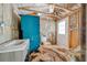 Unfinished bathroom showcasing a toilet, sink, and utilities, revealing an opportunity for customization and renovation at 815 Kentucky Ave, St Cloud, FL 34769