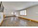 Spacious living room featuring hardwood floors and large windows at 815 Kentucky Ave, St Cloud, FL 34769