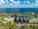 Overhead view of a marina with boats docked and a boat launch area, emphasizing convenient waterfront access at 815 Kentucky Ave, St Cloud, FL 34769