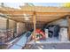 Open shed area with stacks of bricks, construction materials and storage containers at 815 Kentucky Ave, St Cloud, FL 34769