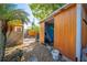 Outdoor storage shed, providing practical storage solutions and blending seamlessly with the surrounding greenery at 815 Kentucky Ave, St Cloud, FL 34769