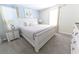 Bright bedroom featuring a comfy bed, soft colors, and serene natural light at 8817 Cruden Bay Ct, Davenport, FL 33896