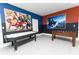 Spacious game room featuring an air hockey table and foosball for endless entertainment at 8817 Cruden Bay Ct, Davenport, FL 33896