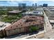 Scenic aerial view shows complex's architecture, surrounding cityscape, and neighborhood at 911 N Orange Ave # 550, Orlando, FL 32801