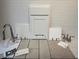 Interior design samples showcase cabinet door styles, flooring, countertop and fixtures at 1011 Wisteria Way, Dundee, FL 33838