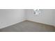 Cozy bedroom featuring neutral carpet, ample natural light, and electrical outlets at 1134 Olivine Ave, Dundee, FL 33838