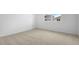 Bedroom featuring neutral carpet, white walls and a window providing natural light at 1138 Olivine Ave, Dundee, FL 33838