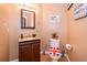 Charming powder room with modern fixtures and decor at 133 Rona Ln, Davenport, FL 33897