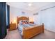 Cozy bedroom with wooden furniture set, ceiling fan, and plush carpeting for added comfort at 133 Rona Ln, Davenport, FL 33897