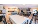 Open-concept layout connecting the kitchen, dining area, and living room for seamless entertaining at 133 Rona Ln, Davenport, FL 33897
