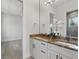 Stylish bathroom with double vanity, marble countertop, and black hardware at 1436 Stetson St, Orlando, FL 32804