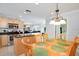 A bright eat-in kitchen featuring a central island and stainless steel appliances at 2173 Victoria Dr, Davenport, FL 33837