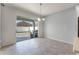 Dining area featuring sliding glass doors to the patio and backyard, providing ample natural light at 2524 Rapollo Dr, Kissimmee, FL 34741