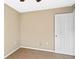 Clean bedroom with neutral colored walls and carpet flooring at 258 Grouper Ct, Kissimmee, FL 34759