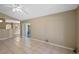 Open floor plan with neutral paint and tile flooring at 258 Grouper Ct, Kissimmee, FL 34759