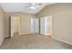 Spacious main bedroom with vaulted ceilings and an ensuite bathroom and closet at 258 Grouper Ct, Kissimmee, FL 34759