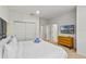 Bright bedroom with cozy bed, dresser and closet at 2621 Corvette Lane, Kissimmee, FL 34746